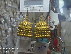 Classic bell-shaped Jhumka drop earrings.
