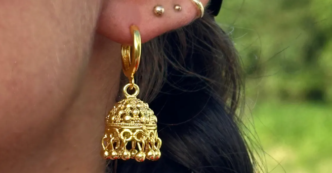 Classic bell-shaped Jhumka drop earrings.